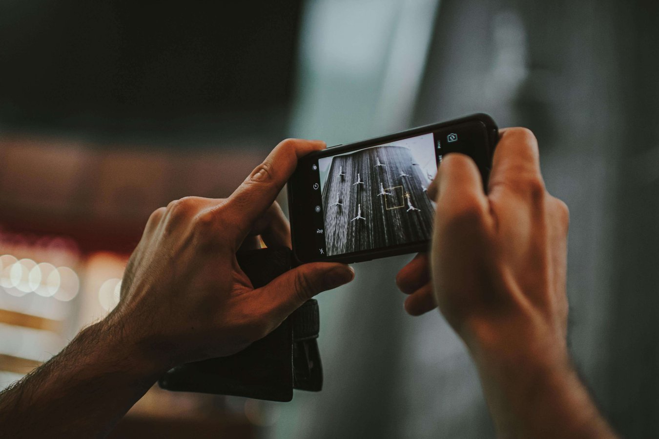 Citizen journalist capturing news with smartphone